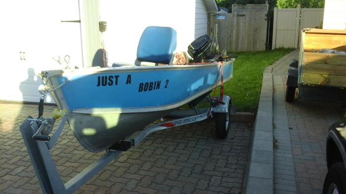 Boat,motor and 2015 trailer