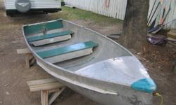 Narrower than regular 12 foot aluminum boats.  great shape.  No leaks.  Comes with revolving padded seats.