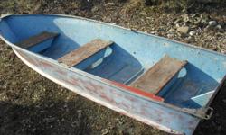 This boat has no holes and is flat backed for a motor
4 feet wide