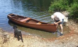 Fiberglass canoe, fitted for rowing. Brass oarlocks, stainless hardware. Comes with oars. See pics. Images from this spring.
Rear hatch with seat pad lost. It's square, so you can easily fit a new one, or if you're handy, laminate your shop scraps and