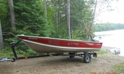 2006 14' WC with 2013 15hp four stroke Honda motor. Includes Karavan trailer and removable plywood floor. Some dock rash on one side but otherwise in excellent condition with absolutely no leaks. This is a very sold stable boat. Asking $4900 or best