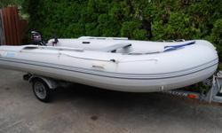 2008 Aquamarine inflatable boat and 25 hp motor. PVC 1100 decitex material same material zodiac uses on PVC inflatables. 2 bench seats, bow bag, lauch wheels, cover, aluminum floor boards, inflatable keel, 10 person or 1250kg, max 35hp.
Powered by 1993
