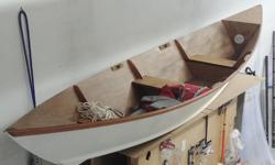 This dory is a shallow-draft boat about 16 feet long. It has high sides, a flat bottom and sharp bows. Artisan built in North Cowichan. Never touched water. Comes with 4 oars (2 are brand new), brass oar locks and life jackets (not shown). For centuries,
