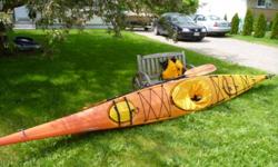 17 foot sea kayak with rudder padded seat and backrest. comes with spray skirt, carbon paddle and life jacket. $1700.00 obo
