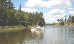 sturdy East Coast built fibreglass hull ready for your choice of outboard. Galvanized roller trailer,Garmin 180 chartplotter with Lake Huron and Lake Superior charts, Sea Sport vhf, Sunbrella cloth camper top, side curtains fair to good, portapotti in V