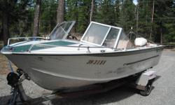 STARCRAFT Aluminum fish and ski 1973 with a 1984 Johnson 115 VRO oil injected outboard.  Engine was completely rebuilt last winter ('11) and has one summer of use on it. (maybe 40hr??) Comes with an EZ load trailer and a ski bar.  Interior and seats are