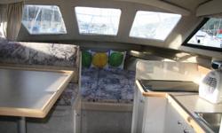 GENERAL DESCRIPTION:
"China Moon"-one of Bayliner's classic "all-weather" family cruising and/or fishing boat.
The helm is closed in with an "Alaskan Bulkhead" (glassed-in helm with
glass lockable door).
 Shows like new with the fiberglass, professionally