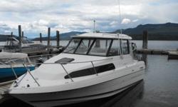 Nice boat in top shape. Boat is powered with a 5 litre merc,closed cooling system, a 9,9 yamaha kicker which is plumbed into main tank and has electric start, Ezee steer. Boat has a cuddy that sleeps 3 and another spot in the cabin. Cuddy has sink with