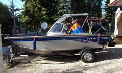 2010 Tracker 175 Pro V boat with 2010 Mercury 115 HP Four Sroke outboard motor with tilt and trim controls. Unit comes with custom Tracker trailer with 15 inch wheels and white letter tires. Tracker travel tarp as well as canvas bimini top and full