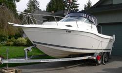 Similar to a Trophy, this 21? Seaswirl Striper walk around (1998) with a new (2010) 175 HP Mercury Verado four-stroke with less than 50 hours. A great fishing/cruising boat with the largest cuddy cabin we?ve seen on a 21 footer. We?ve slept two adults and