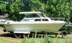 22' Glas Ply cabin cruiser on 4 wheel EZ Loader trailer. Both in great condition, ready to fish. Built in Washington state for west coast waters. All fiberglass, no wood stringers. Mercruiser inboard/outboard with 305 Chevy engine. Full canvas top, plus