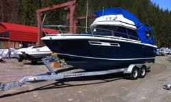 Beautiful boat and must be seen to be appreciated.  350 inboard 260hp and brand new alpha bravo leg with 3 year warrenty.  Boat sleeps 4 and has a big birth.  Lower helm and command bridge.  gas stove, sink, ice box and head or bathroom.  8 foot beam and