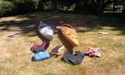 two ocean kayaks with all accessories - (1) Current Design Storm 17ft. - (1) Necky Narpa 17ft.