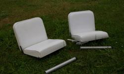We have for sale one set of white vinyl fold down pedastal boat/cruiser seats (right & left).
They each measure 19 1/2"w x 19" seat with a 16" high back.
They are in excellant condition no rips or tears.
They could probabley be adapted to sit on a