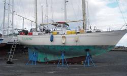 Ketch rig.
Aft cabin, centre cockpit
A heavy duty motor sailor.
Fast under sail or motor and very responsive.
Full keel
LOA 36 ft. 1 in.
Beam 11 ft. 1 in.
Draft 5 ft.
Displacement 20,383 pounds,
Permanent dodger. Great shelter for our wet cool summers and