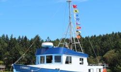 Converted fishing troller built 1962. Red cedar hull. Aluminum rails. LOA 37', beam 12', draws 4'. Volvo marine diesel, 6 cyl in-line, 80 hp. Surveyed out-of-water 2013.
Located in Sidney, BC. Moorage is in beautiful location at end of small private dock