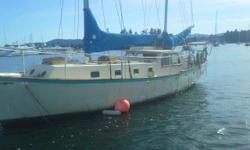 On June 29 2016, after a 3 month wait I finally took possession of my 42' ketch. She was anchored at the entrance of Tsehum Harbour . Her name is Dreamers 2, and is off white with a strip around the hull. Double mast and made of ferro-cement. I returned