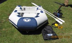 9 ft. Aqua Marina Inflatable soft bottom boat for sale. Comes with wooden seat, two aluminum oars, hand air pump, storage bag. 45 lb 12 volt 5 speed Minn Kota electric motor. 12 Volt deep cycle battery with case. Boat has only has 10 hours use.This is a