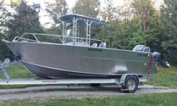 Custom built fishing boat that was made with an extra wide and extra deep hull. Fully loaded and ready to go.
Tuff trailer, reinforced all aluminum bimini top, depth sounder and GPS. Used only five times in fresh water.