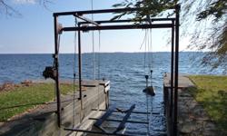 I have a boat lift for a small boat or jetski. Lift is approx 11ft wide and is made of very heavy duty steel.  Lift is disassembled and ready to go.  Previously held small fishing boat, and most recently my jetski.  Does not include jetski cradle shown in