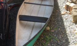 13ft fiberglass canoe. Older but in good condition.