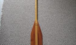 Custom made Grey owl paddle ,maple and cherry ,57" long with tear drop handle and 6" wide blade .Weighs about 18 oz. A very high quality paddle.