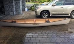 Evergreen Willow Canoe for sale. One owner, used 3 times. Has been stored in a garage all of its life. Comes with 4 paddles. Purchased initially from MEC.