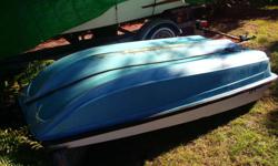 This is a fiberglass row-boat that we have used at our cabin for years. It is 8' OAL by 48" wide. I would say it weighs about 150 lbs. It has two removable seats and oar locks. We don't have the paddles for it any more. The keel has been repaired in the