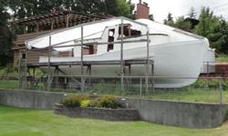32 ft. Extensively rebuilt. Needs finishing, Must go. No time.
Lots of parts available
Best offer.