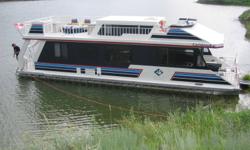 42' House Boat For Sale!!!
Completely refurbished in 2005 by Twin Anchors!!
3 litre Mercursier mortor, Alpha I Drive
Comes completely equipped with, fridge,freezer, furnace, water heater, waterslide, upper penthouse, sleeps eight!!
 
Available mid August