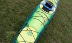 Just Add Ocean..... 18' ocean kayak, custom paint, in great shape..... INCLUDED: -WaterStick carbon fiber bent paddle -Collapsible kayak cart -Life jacket -Spray skirt -Half spray skirt -Pump float -Throw line
