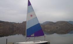 1983 Laser Sailboat  13 ft 10" 
Single handed sailboat, can be sailed by one or two people.
Easy to transport on a car roof-rack.
Sail #112294, Serial #ZFSB2294M831
Blue hull, purple and blue sail.
Everything is in very good condition, ready to sail.
