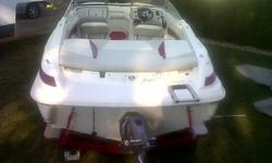 BEAUTIFUL!!!!!!  20 FT larson inboard motor boat seats 10 person color red and white, with tandom trailor, 5L volvo engine, table, both cover tarps one travel and storage with 90 hrs on engine plus 2 year warrenty perfect for water skiing!  call