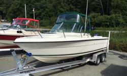 Year 2000 Pursuit Kodiak 23', brand new enclosure, brand new alum. trailer, no motor, rigged for a Yamaha. VHF,stereo, in over all very good condition. Click on view sellers list to view more boats.