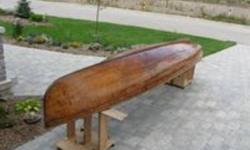 Rare 16 foot Lakefield rowboat. Built by the Lakefied Canoe Co about 1915.
Boat refinished. Had been in storage for over 50 years. 95% original. This is a 2 person rowboat. It also has floor boards with adjustable footrests for rowing. One set of antique