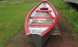 14 foot Rowing dory comes with oars, nice little boat hard to find a real dory, asking $300.00 call 902 583 2440