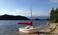 Famous WWP15 sailboat in excellent condition. It has only been on the water a few times. Can sleep two adults; easily beachable; - floats in 7 inches of water with the swing keel up and 3 feet with the keel down. 15' long, 5'6" wide, easily fits in