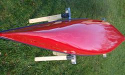 Expedition Kevlar layup, aluminum gunwales, ash/cherry interior, skid plates, kneeling thwart, very lightly used on flat water only