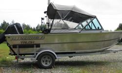 2006 Alumaweld 17'6 Talon boat with a 60 mercury motor also comes with a 2009 9.9 mercury.  2006 ez loader trailer, canvas cover, fresh water holding tank, walk through bow, lots of storage, anchor, excellent on gas